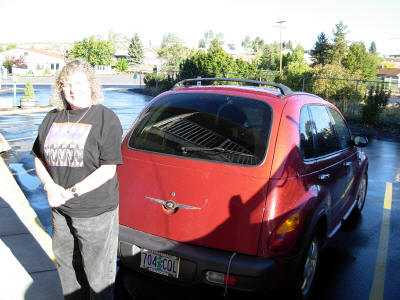 Laura squints into the sudden sunlight as we get ready to leave